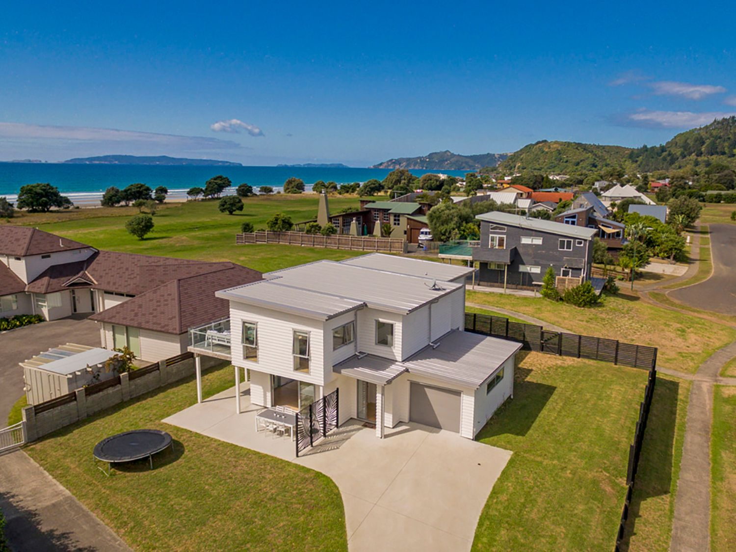 Aerial view of Coastal Pearl with Matarangi beach beyond