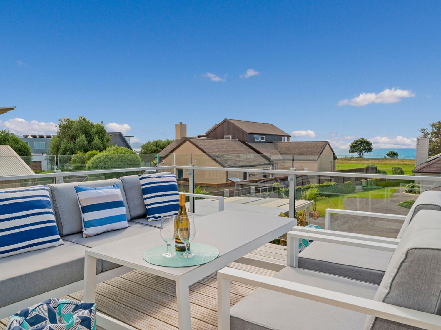 Outdoor lounge on the upper deck overlooking the coast