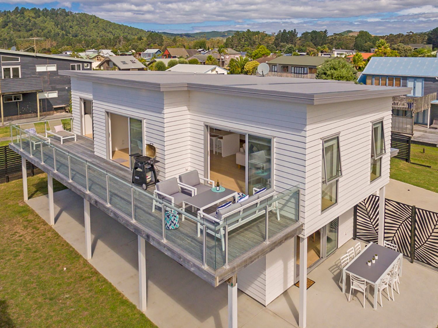 Wraparound upper deck at Coastal Pearl — ideal post-round relaxation